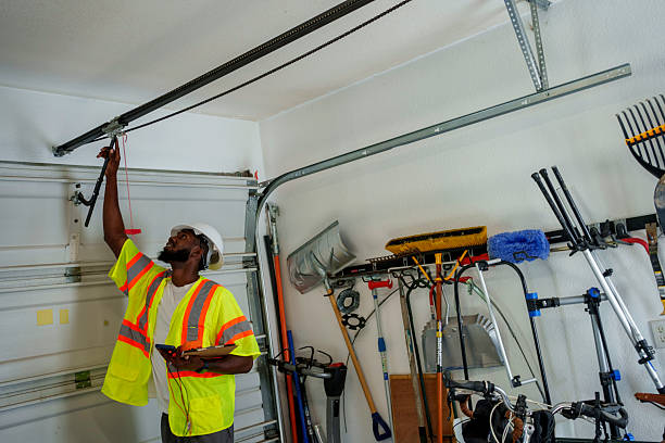 Professional Garage Door Panel Replacement technician working in East Spencer, NC
